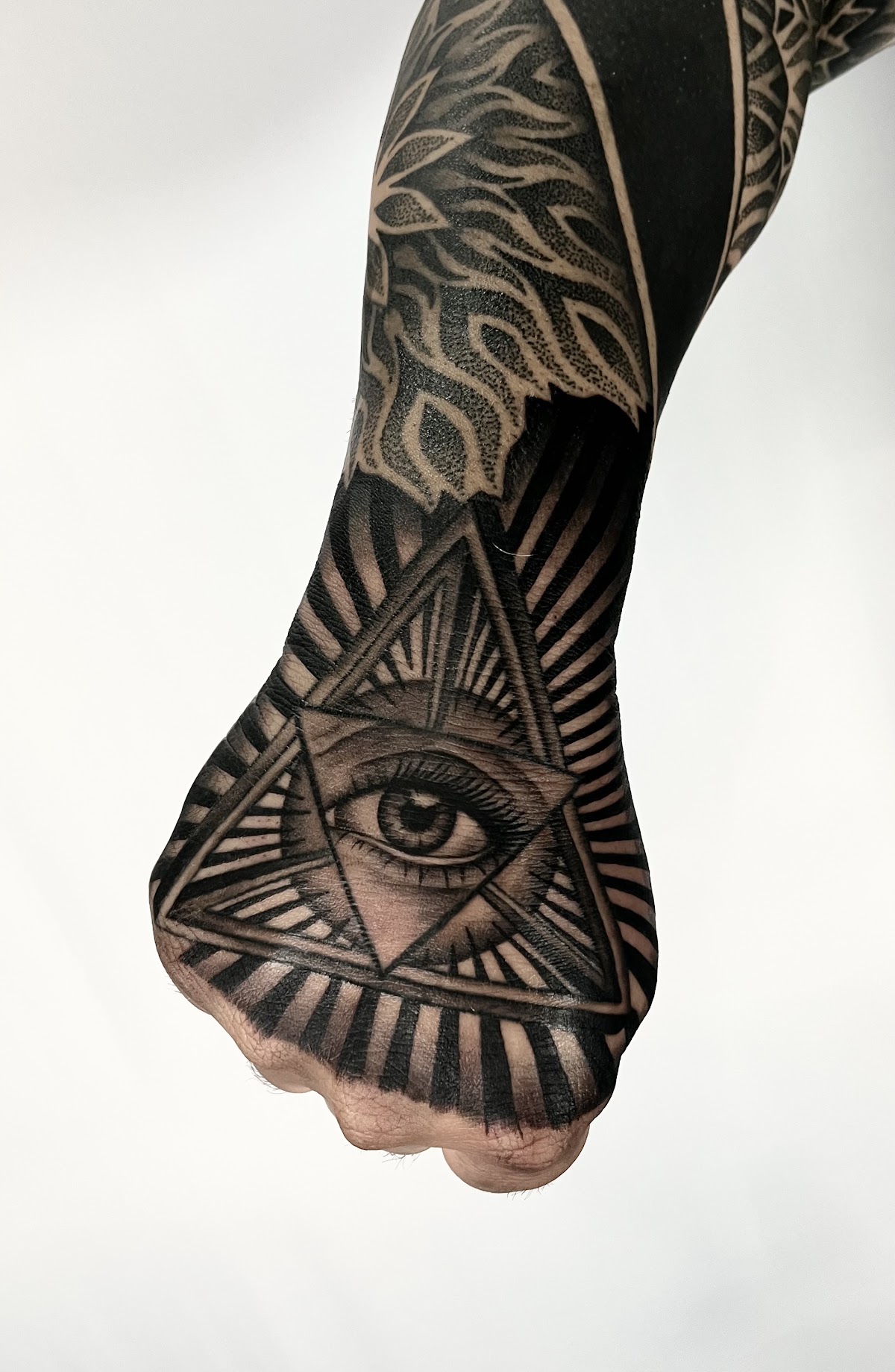 All-seeing eye geometric hand and arm sleeve tattoo